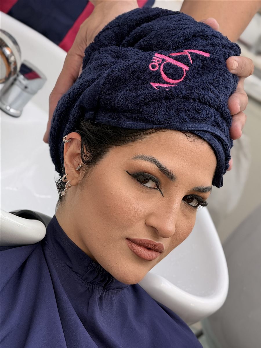 Salon client wearing the KPV Pro towel
